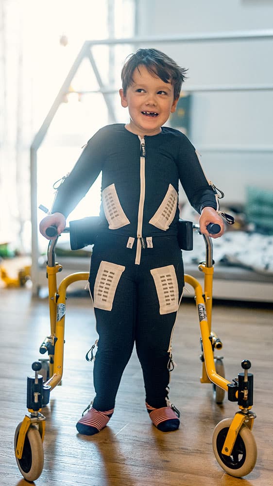 Boy in Walker to Help Him Walk — Wearable Technology - Mollii Exopulse